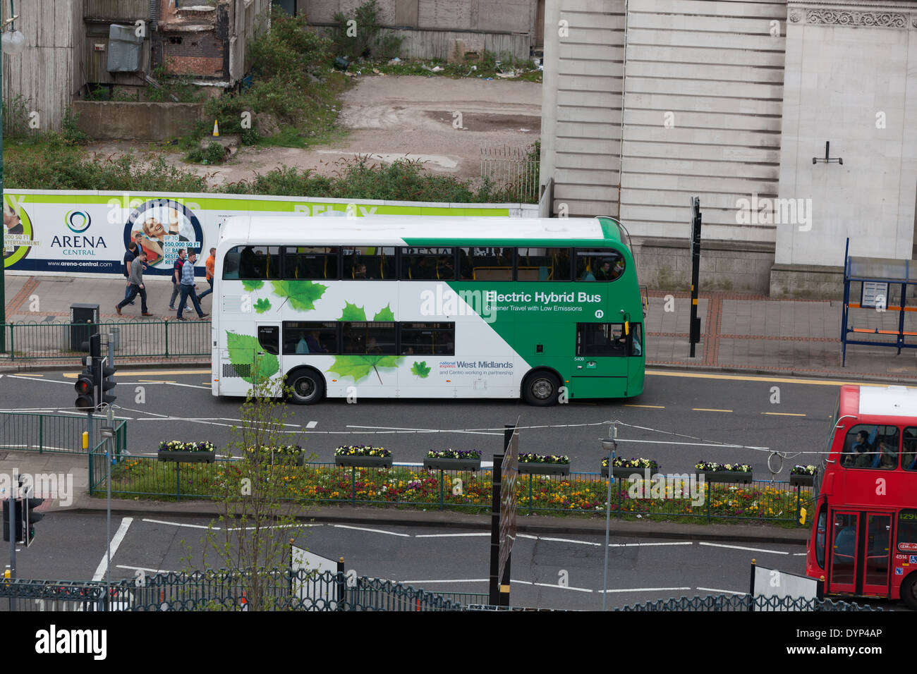 Electric hybrid doubledecker bus in service in Birmingham city center. Helping to reduce emissions and pollution. Stock Photo