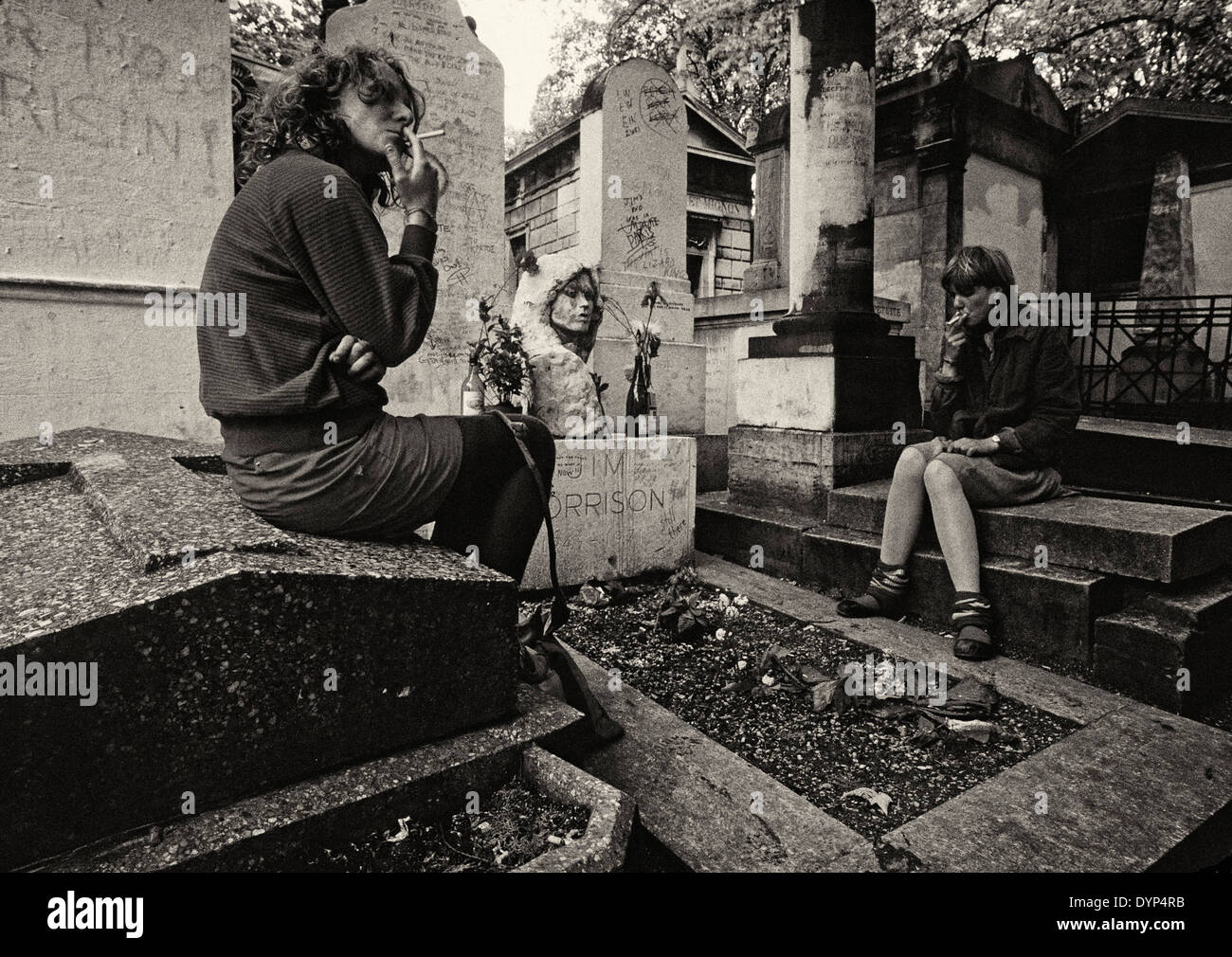 The grave of Jim Morrison. lead singer of the Doors rock band in Père Lachaise cemetery, Paris, 1983 Stock Photo