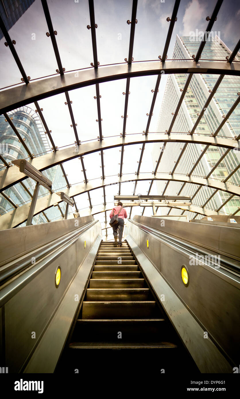 Escalator going up at Canary Wharf Tube station, London financial centre. Stock Photo