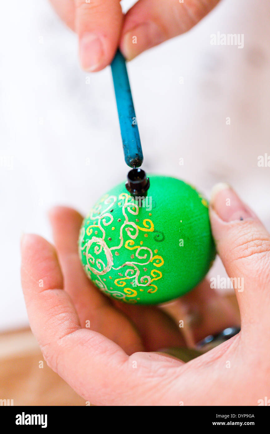 Hand painted Ukrainian Easter eggs decorated with folk designs using a