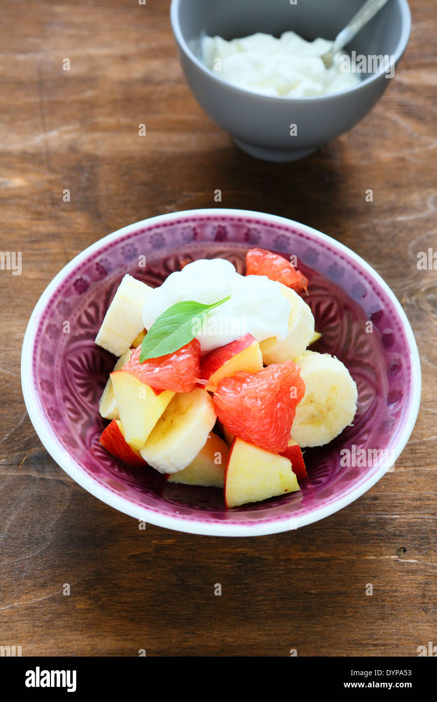 fruit salad with yogurt, food closeup Stock Photo
