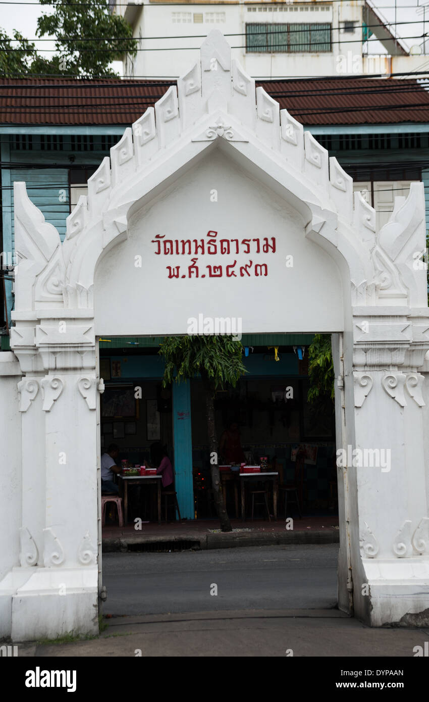 A white Thai temple column pillars with Thai words written and date in which it was built. Stock Photo