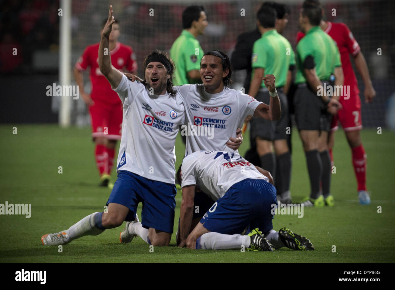 Toluca, Mexico. 23rd Apr, 2014. Mariano Pavone (L) and Gerardo Flores (C)  of Cruz Azul celebrate after winning the second leg match of the CONCACAF  Champions League Final against Toluca at Nemesio