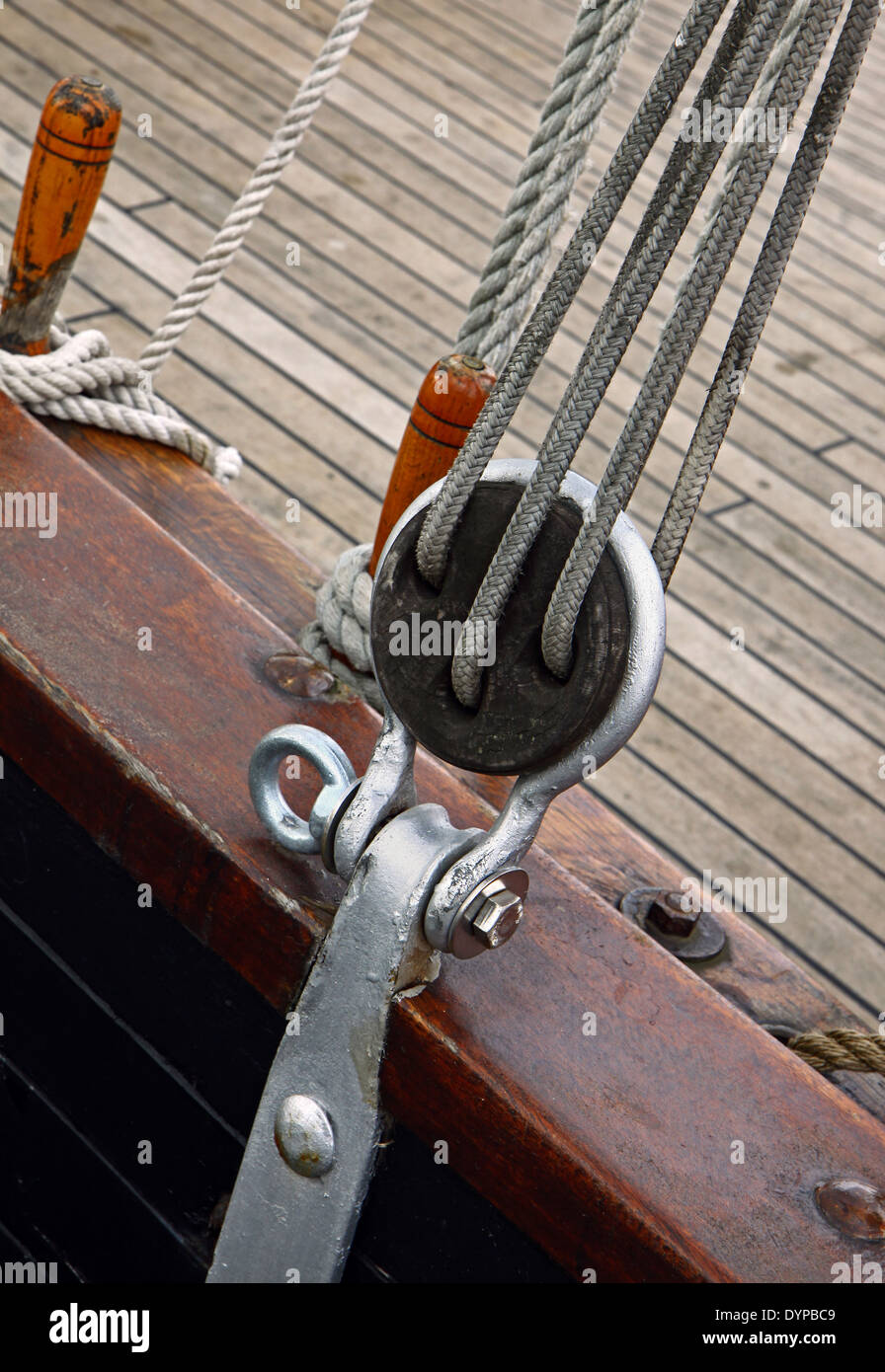 Boat equipment details, pulley, ropes and a part of broadside Stock