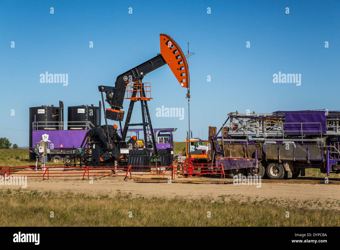 An oil production pumper in the Bakken field near Stoughton, Saskatchewan, Canada. Stock Photo