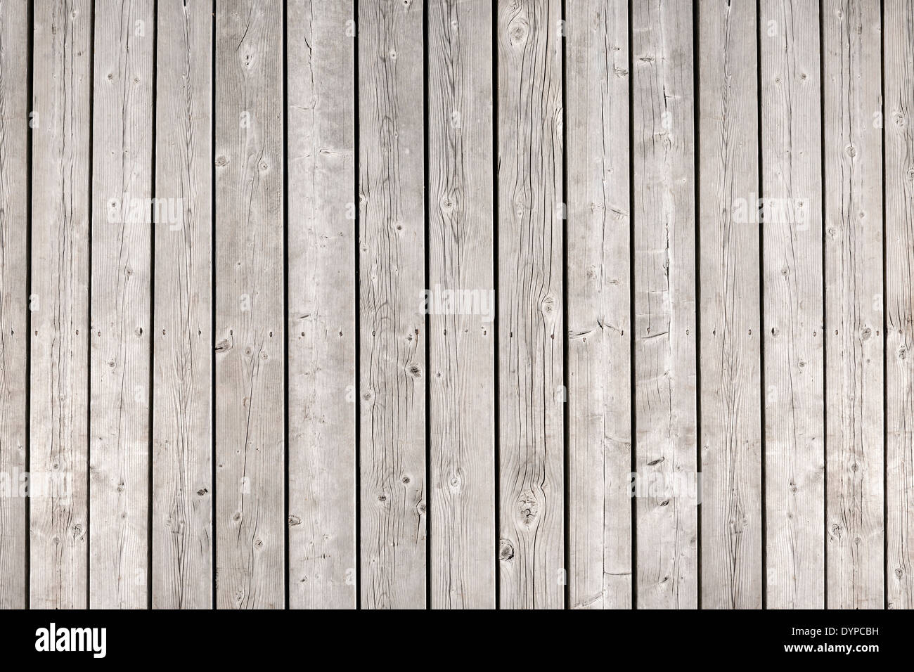 Background of old wooden weathered unpainted deck planks Stock Photo
