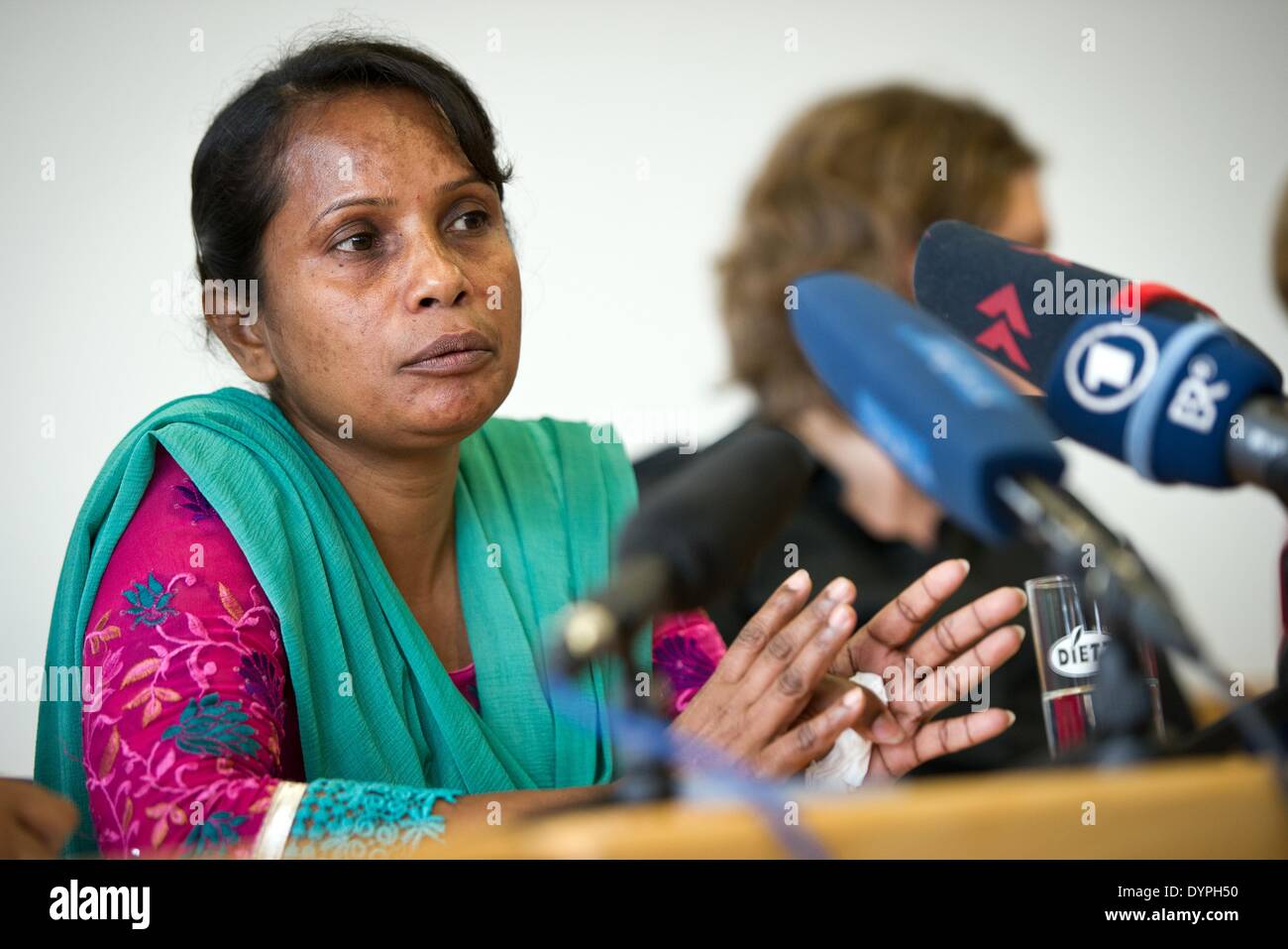 Berlin, Germany. 24th Apr, 2014. Safia Parvin, trade unionist for the Bangladeshi National Garment Workers Federation (NGWF) speaks during a press conference in Berlin, Germany, 24 April 2014. Topics of the press conference were compensation payments from German companies to the victims of the collapsed Rana Plaza textile factory. Photo: DANIEL NAUPOLD/dpa/Alamy Live News Stock Photo