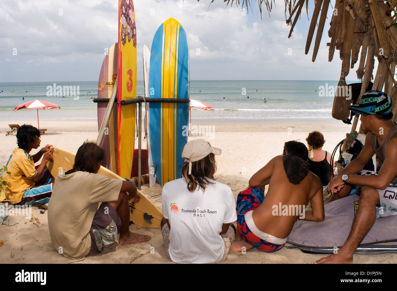 Lessons of surf on the beach of Kuta. Surfing lessons. Bali. Kuta is a coastal town in the south of the island of Lombok in Indo Stock Photo
