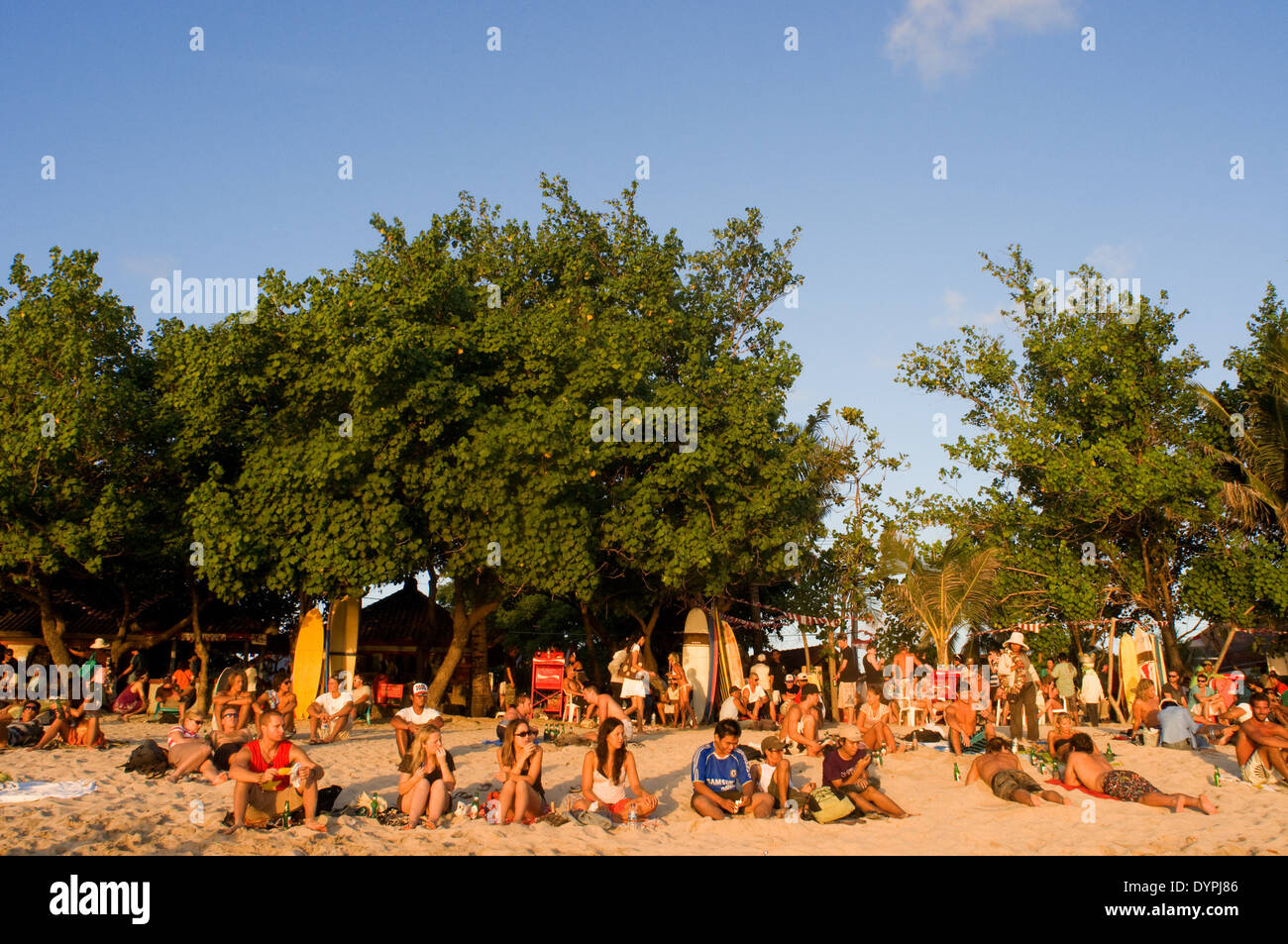 Beach of Kuta at sunset. Surfing lessons. Bali. Kuta is a coastal town in the south of the island of Lombok in Indonesia. Stock Photo