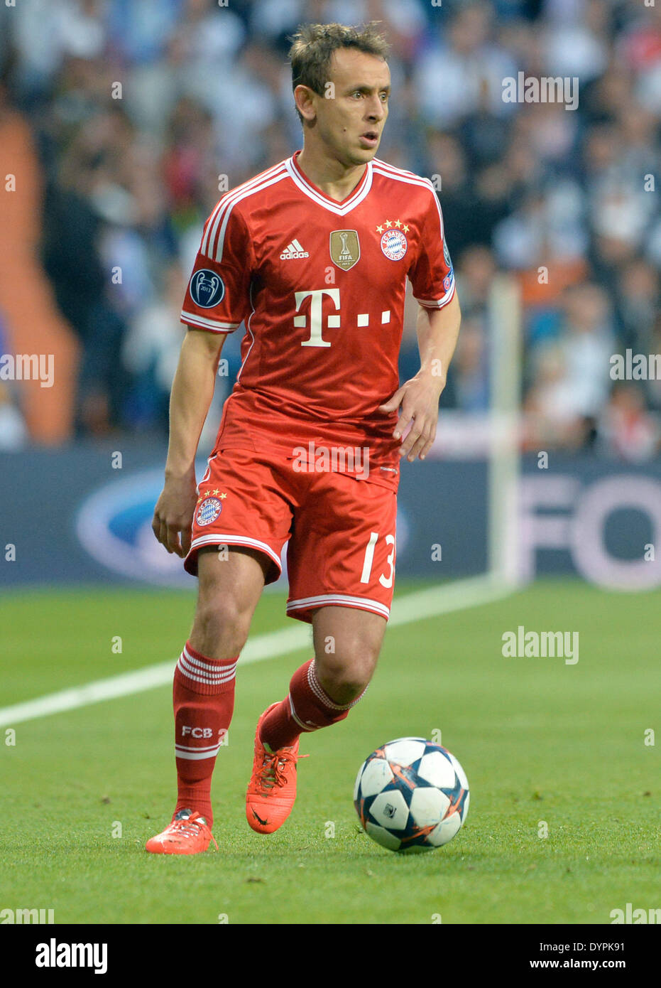 Madrid, Spain. 23rd Apr, 2014. Munich's Rafinha in action the UEFA Champions League semi final first leg soccer match between Real Madrid and FC Bayern Munich at Santiago Bernabeu stadium in Madrid, Spain, on 23 April 2014. Photo: Peter Kneffel/dpa Credit:  dpa picture alliance/Alamy Live News Stock Photo