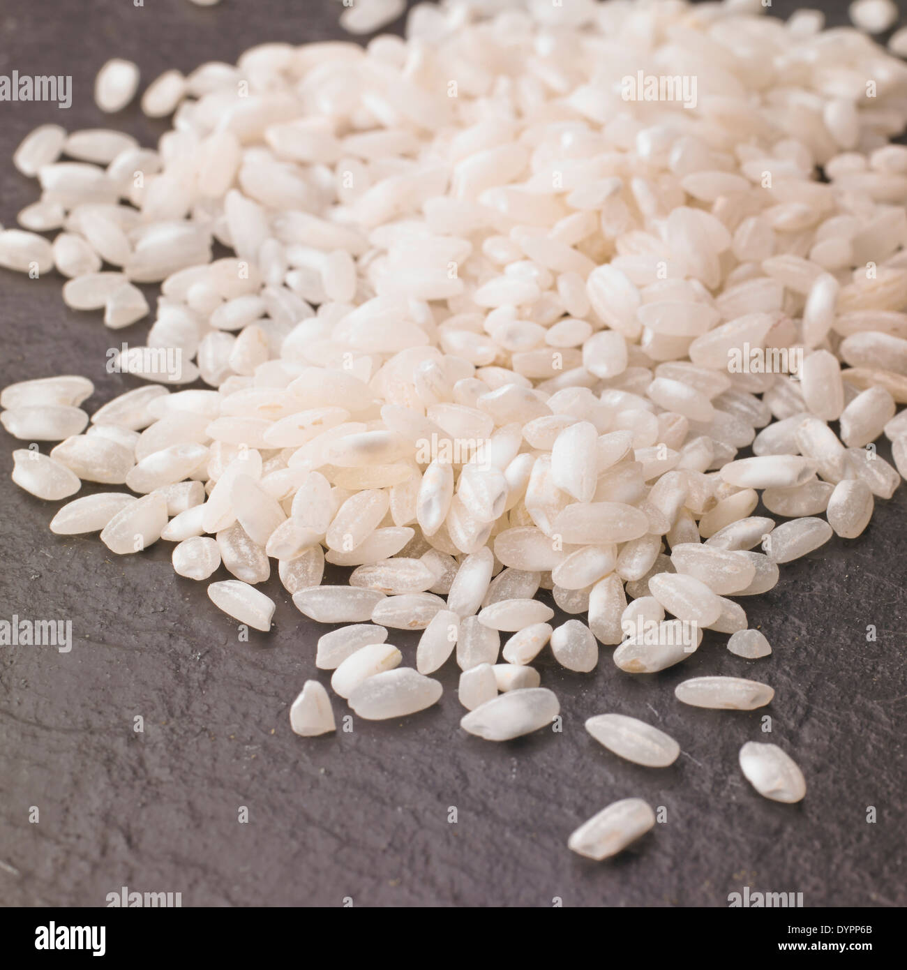 Arborio Risotto Rice on a slate background, Studio Shot Stock Photo Alamy