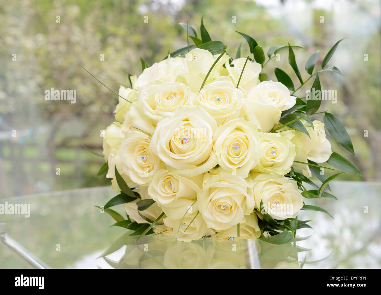 Brides bouquet of beautiful yellow roses on wedding day Stock Photo