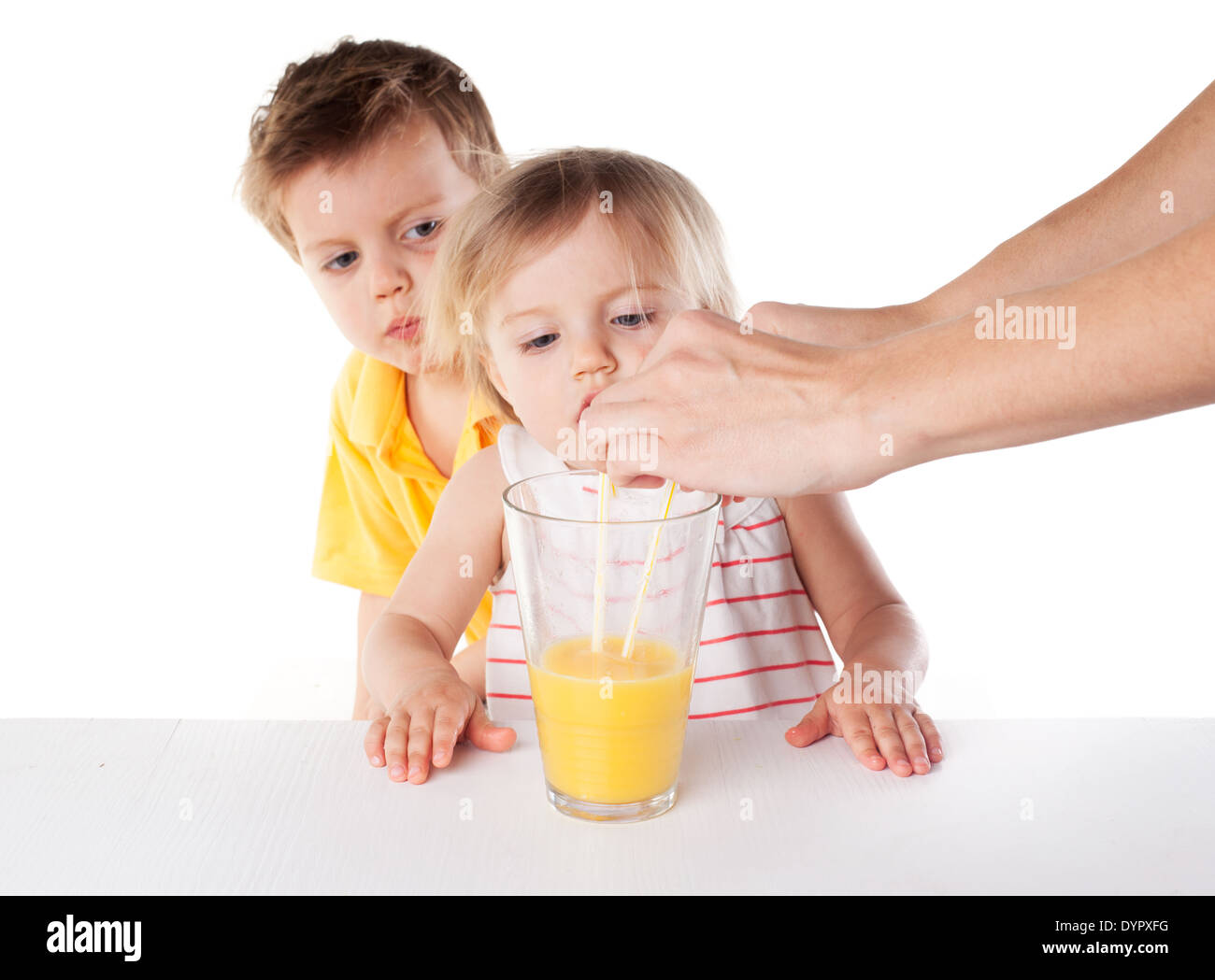 happy children drink orange juice isolated on white Stock Photo - Alamy