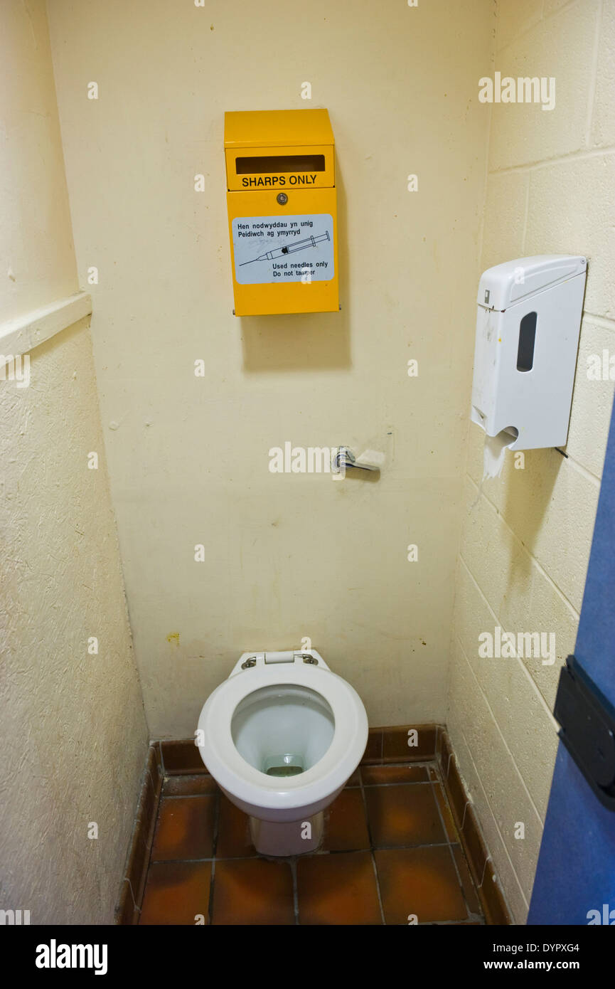 SHARPS ONLY box in public toilet at Bangor Gwynedd North Wales UK Stock