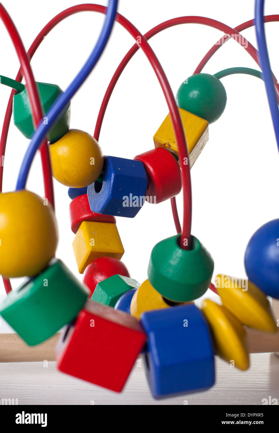 pretty baby with color educational toy Stock Photo - Alamy