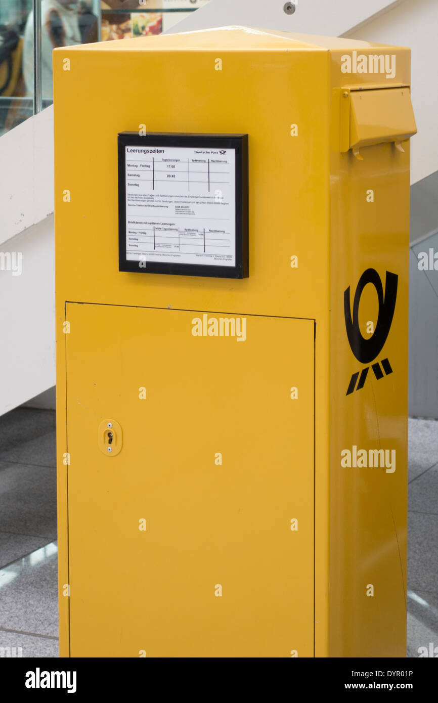 Yellow letterbox Deutsche Post, in the Airport Munich II, Bayern, Germany  Stock Photo - Alamy