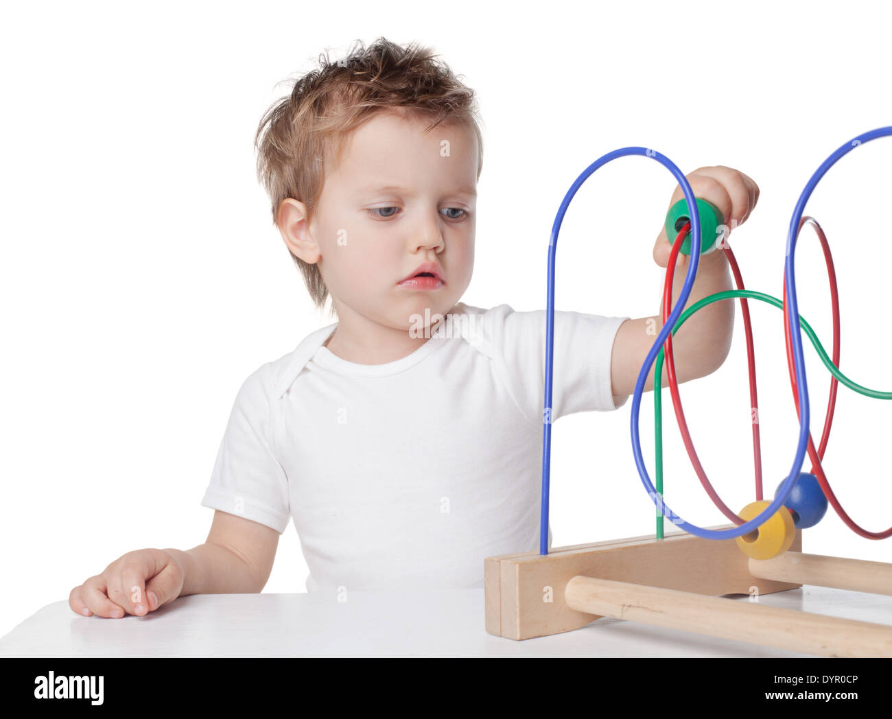 pretty baby with color educational toy Stock Photo - Alamy