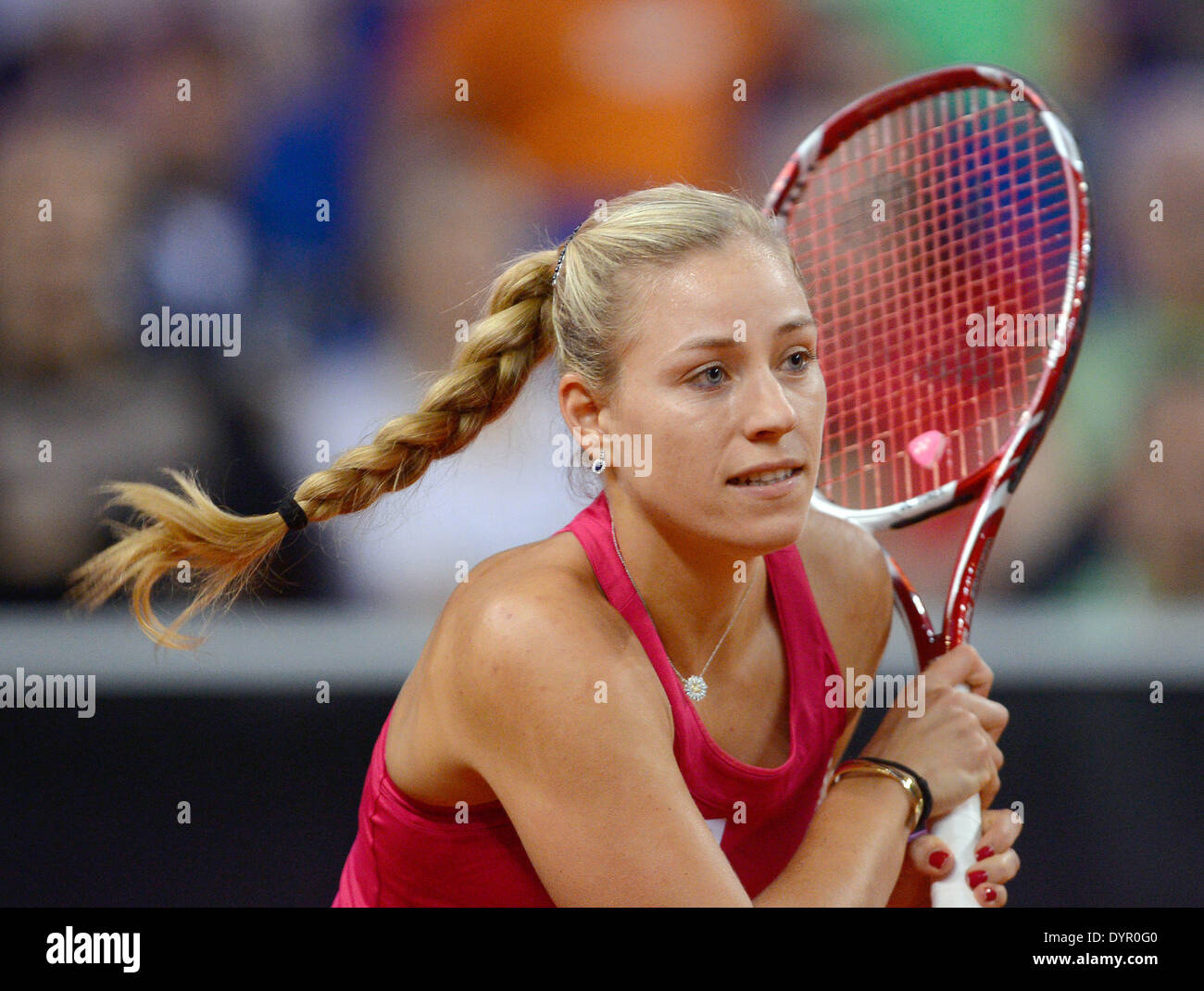 Stuttgart, Germany. 24th Apr, 2014. Germany's Angelique Kerber plays the ball during the second round match for the WTA tennis tournament against Navarro of Spain in Stuttgart, Germany, 24 April 2014. Photo: DANIEL MAURER/dpa/Alamy Live News Stock Photo