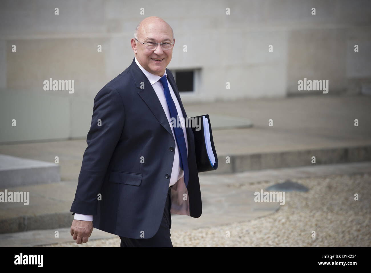 Paris, FRA. 23rd Apr, 2014. French Finance Minister Michel Sapin leaves the Elysee palace on April 23, 2014, in Paris, after the weekly cabinet meeting. (Photo/Zacharie Scheurer) © Zacharie Scheurer/NurPhoto/ZUMAPRESS.com/Alamy Live News Stock Photo