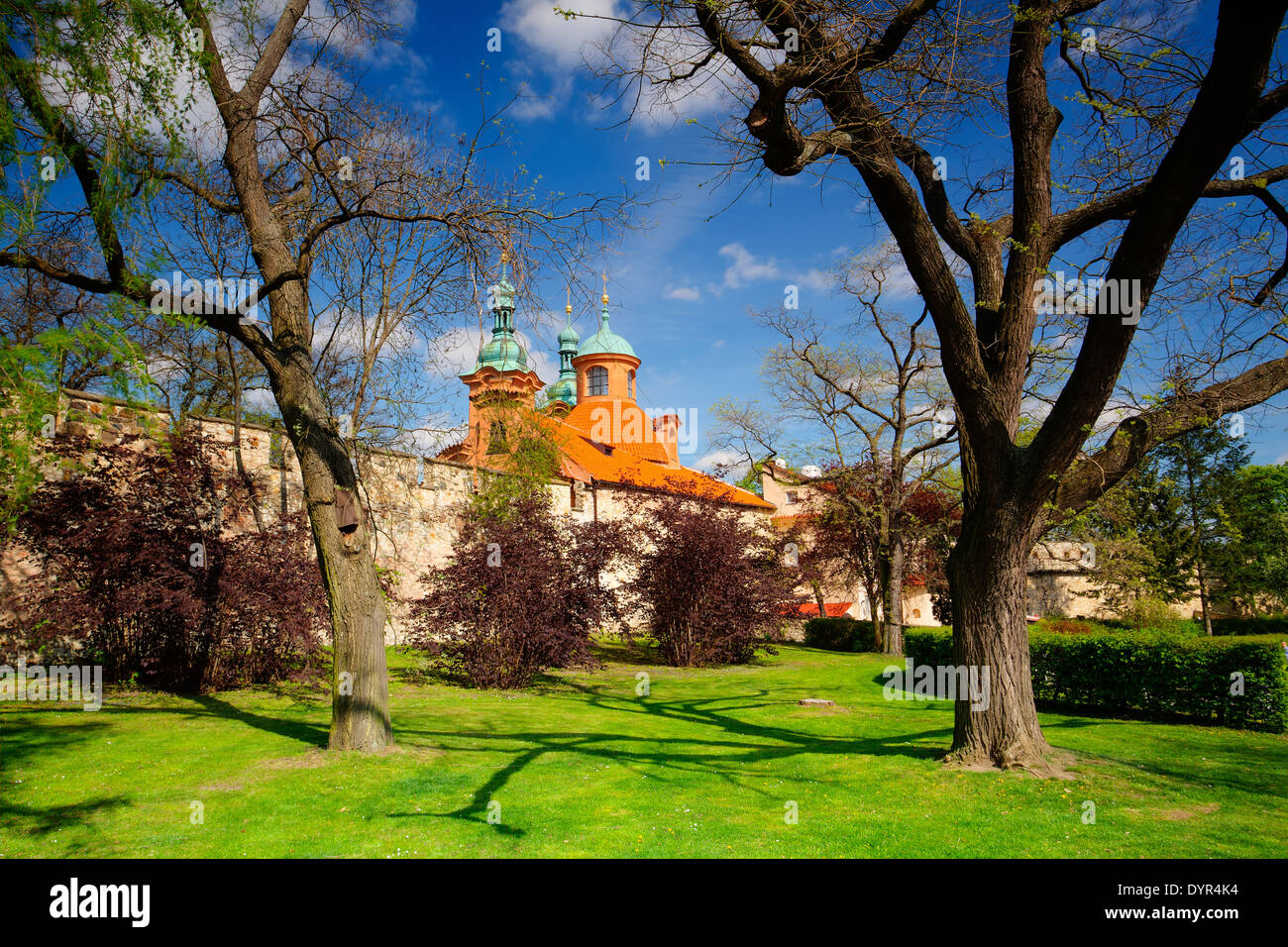 St.Lawrence church in spring park on Petrin hill in Prague Stock Photo
