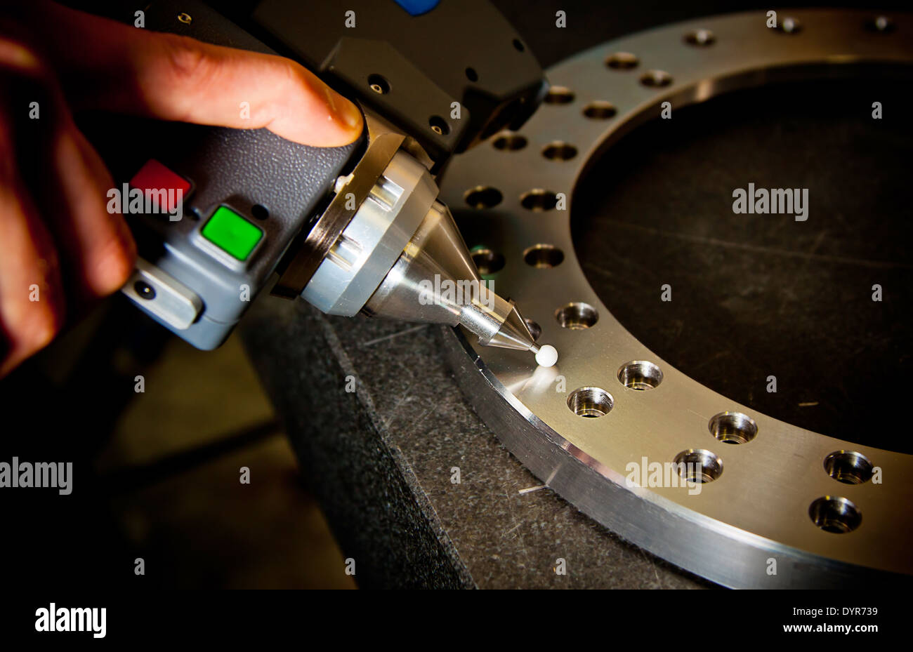 Detail of the tip of a 3d laser scanner mechanical arm. Shallow depth of field, focus on the tip. Stock Photo