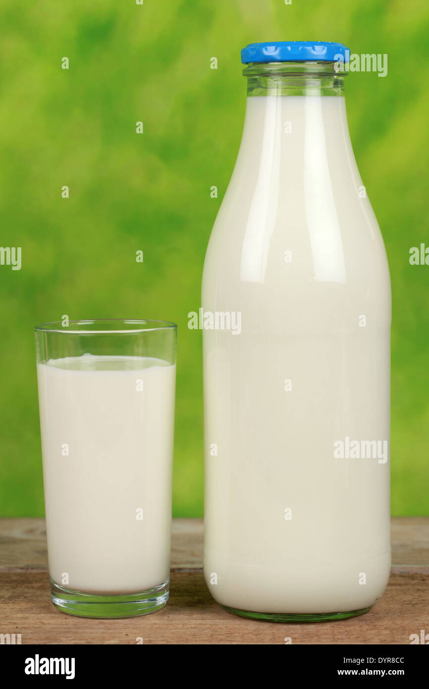 Organic milk in a bottle and in a glass Stock Photo