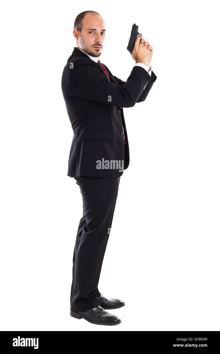 A Well Dressed Businessman With A Gun Posing Like A Secret Agent Stock 