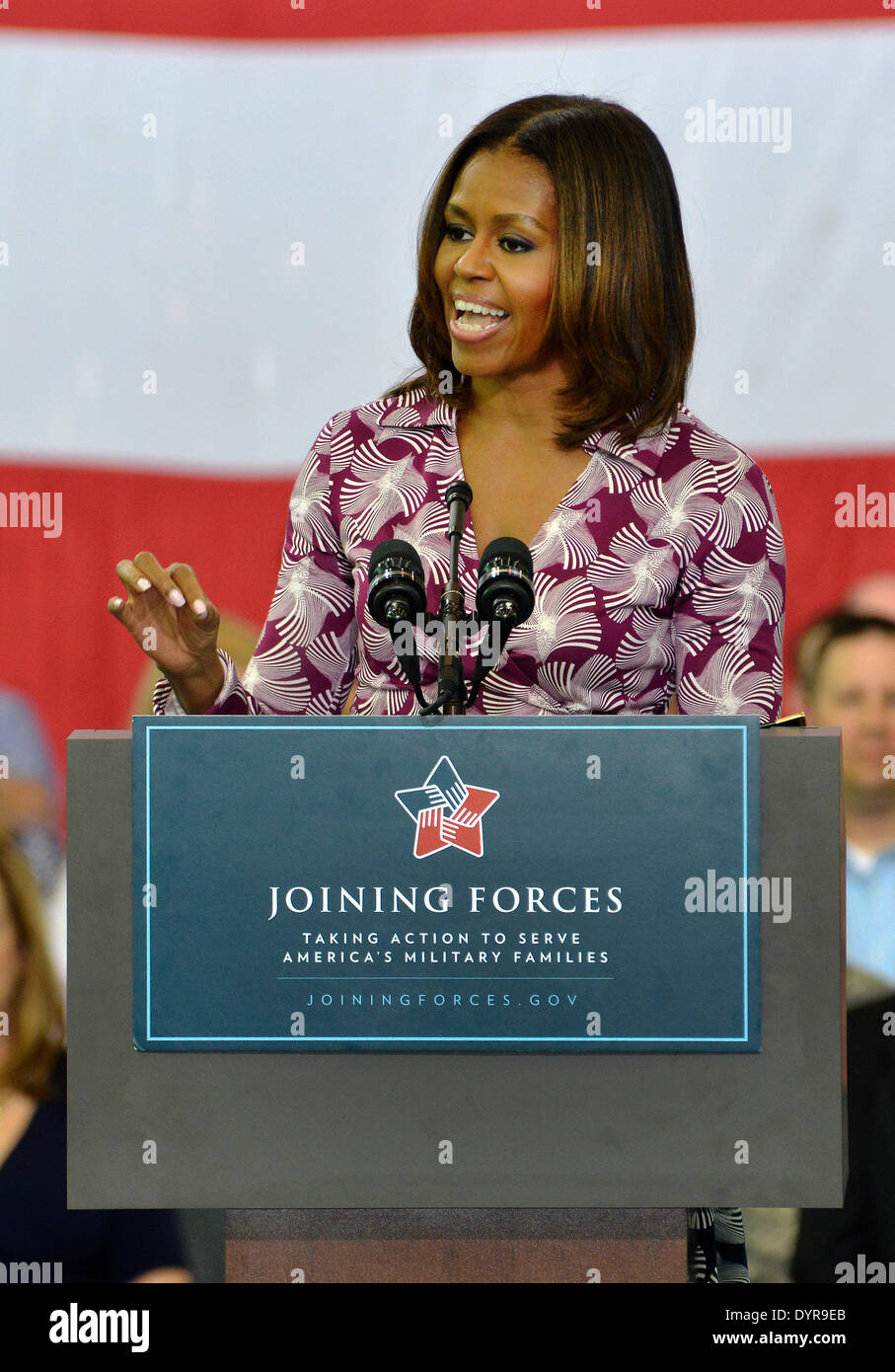 US First lady Michelle Obama speaks to soldiers, family members and employers during a veterans job summit and career forum at Fort Campbell April 23, 2014, Hopkinsville, Kentucky. Stock Photo