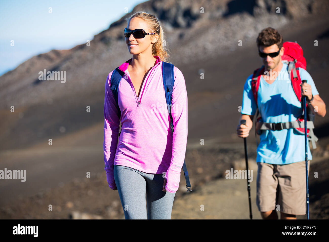 Happy man woman hiking mountains hi-res stock photography and images ...
