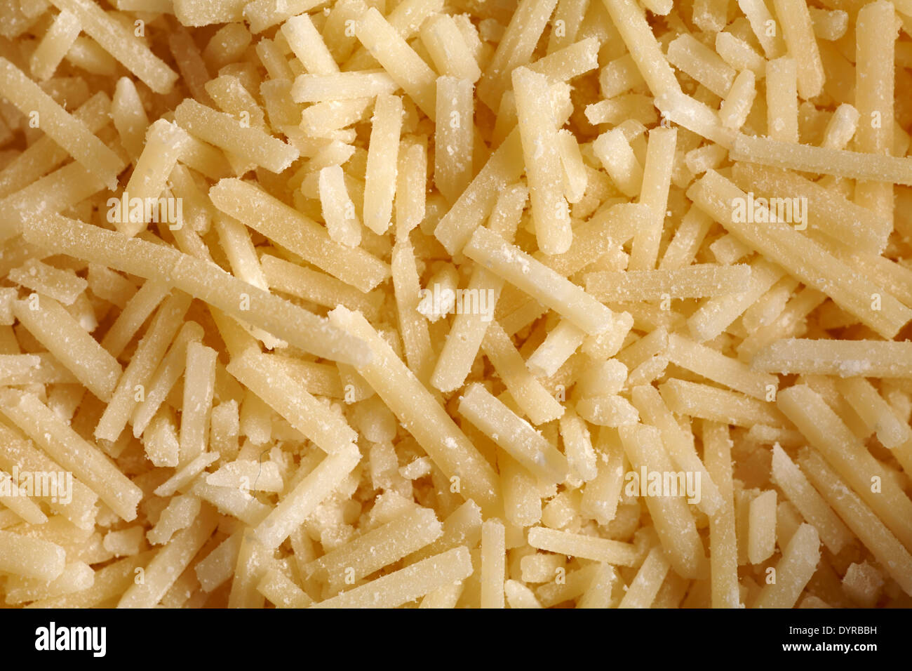 Shreds of Parmesan cheese Stock Photo