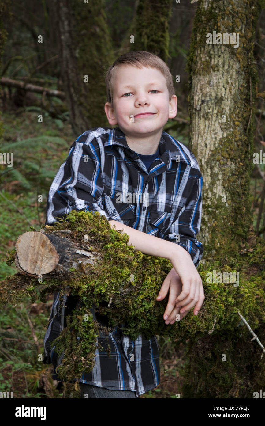 Portrait of a young happy boy outdoors Stock Photo