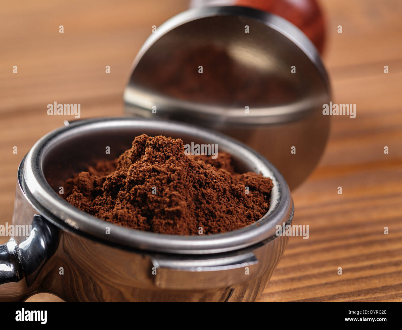 ground coffee in portafilter ready for tamping, colse up Stock Photo Alamy