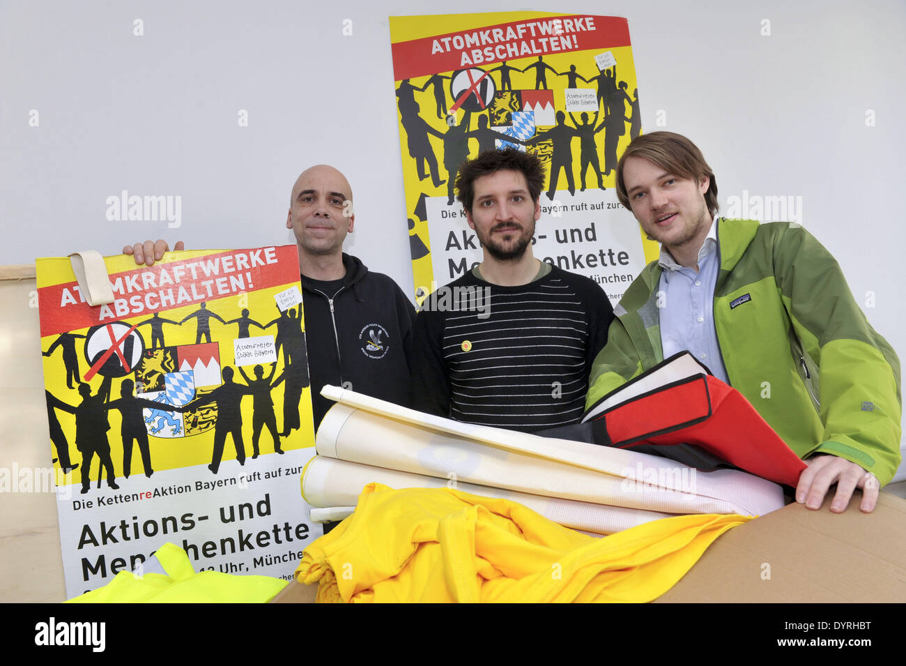 Hagen Pfaff, Bjoern Meyer and Florian Sperk organizing an anti-nuclear demonstration in Munich Stock Photo