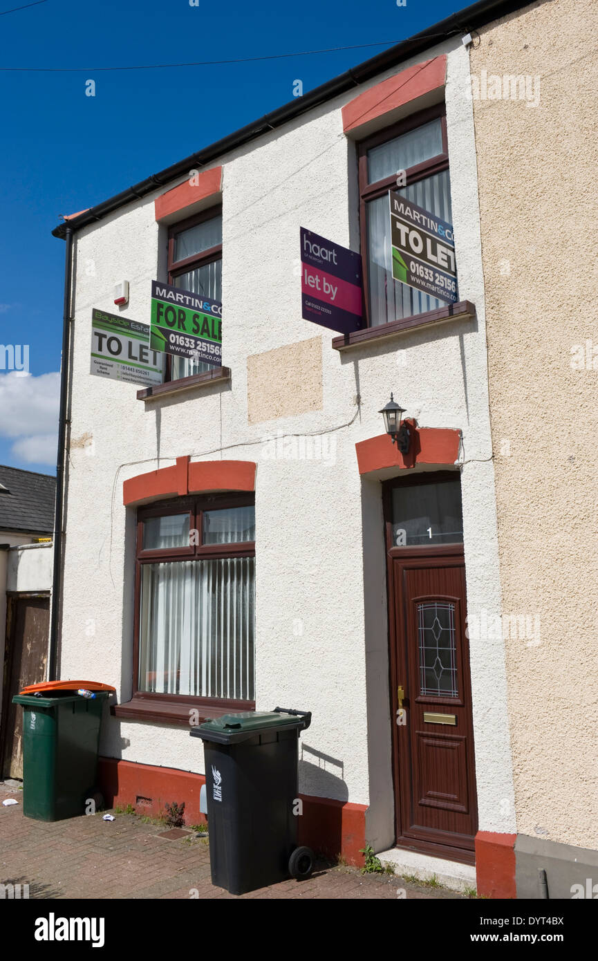 For sale and to let signs on end of terrace house Newport South Wales