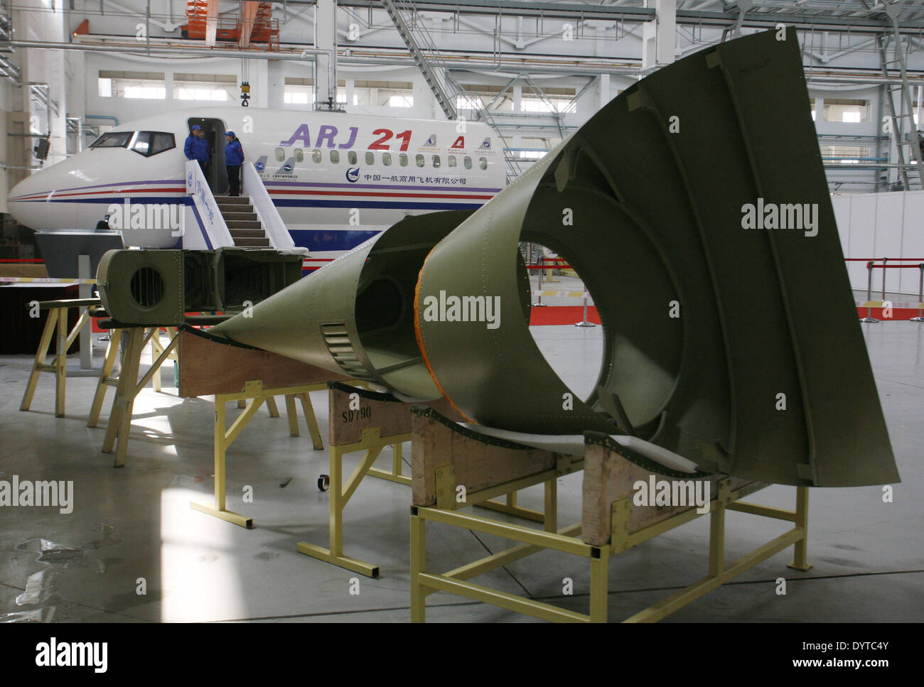 ARJ-21's aircraft's parts on display in front of a ARJ-21 model at Shanghai Aircraft Manufacturing Factory in Shanghai Stock Photo