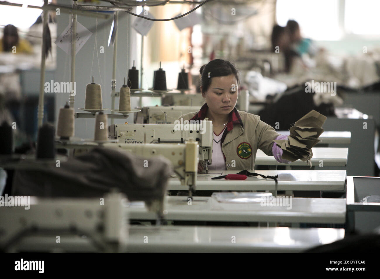 Workers assemble garments at the Ever- Glory International Group factory in Nanjing Stock Photo