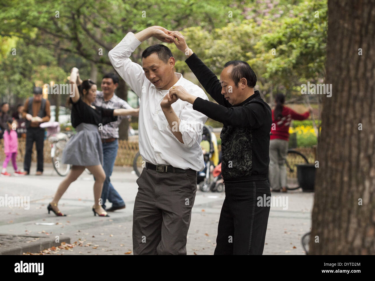 Two men practise ballroom dancing at a park Stock Photo - Alamy