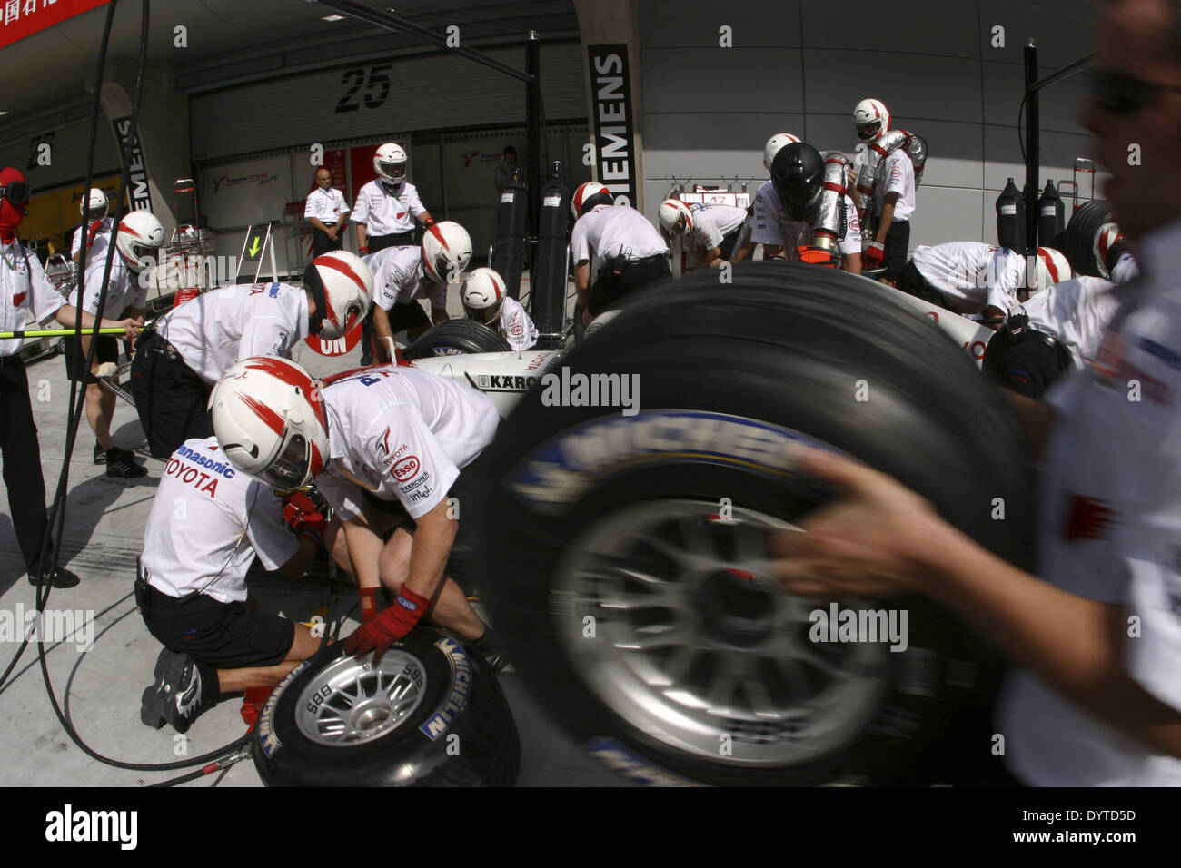 Pansonic Toyota team practices tire changing at the Chinese first Grand Prix on Sunday Sept Stock Photo