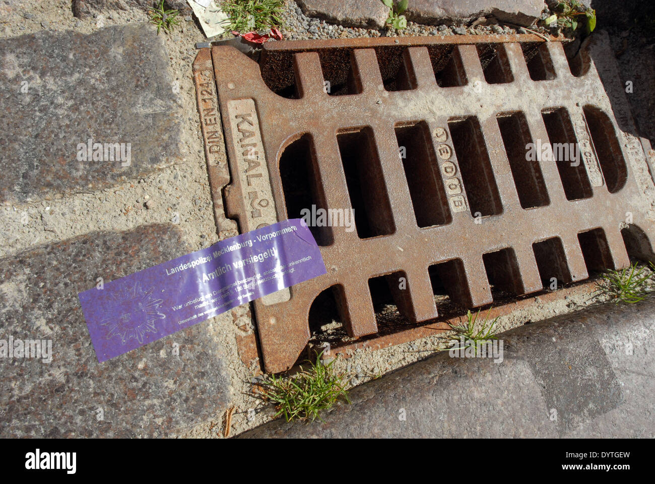A sealed manhole cover Stock Photo
