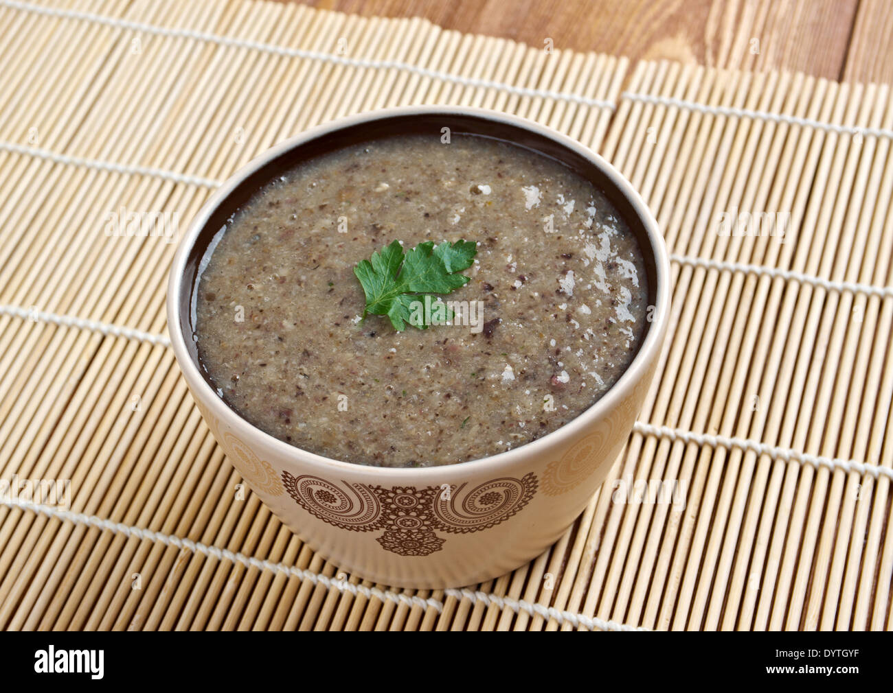 Mushroom cream soup on a table Stock Photo