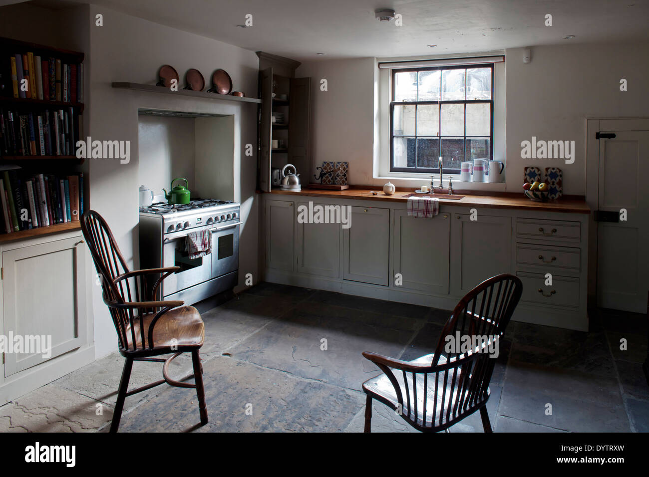 Period chairs in basement kitchen, Whitechapel, London Stock Photo