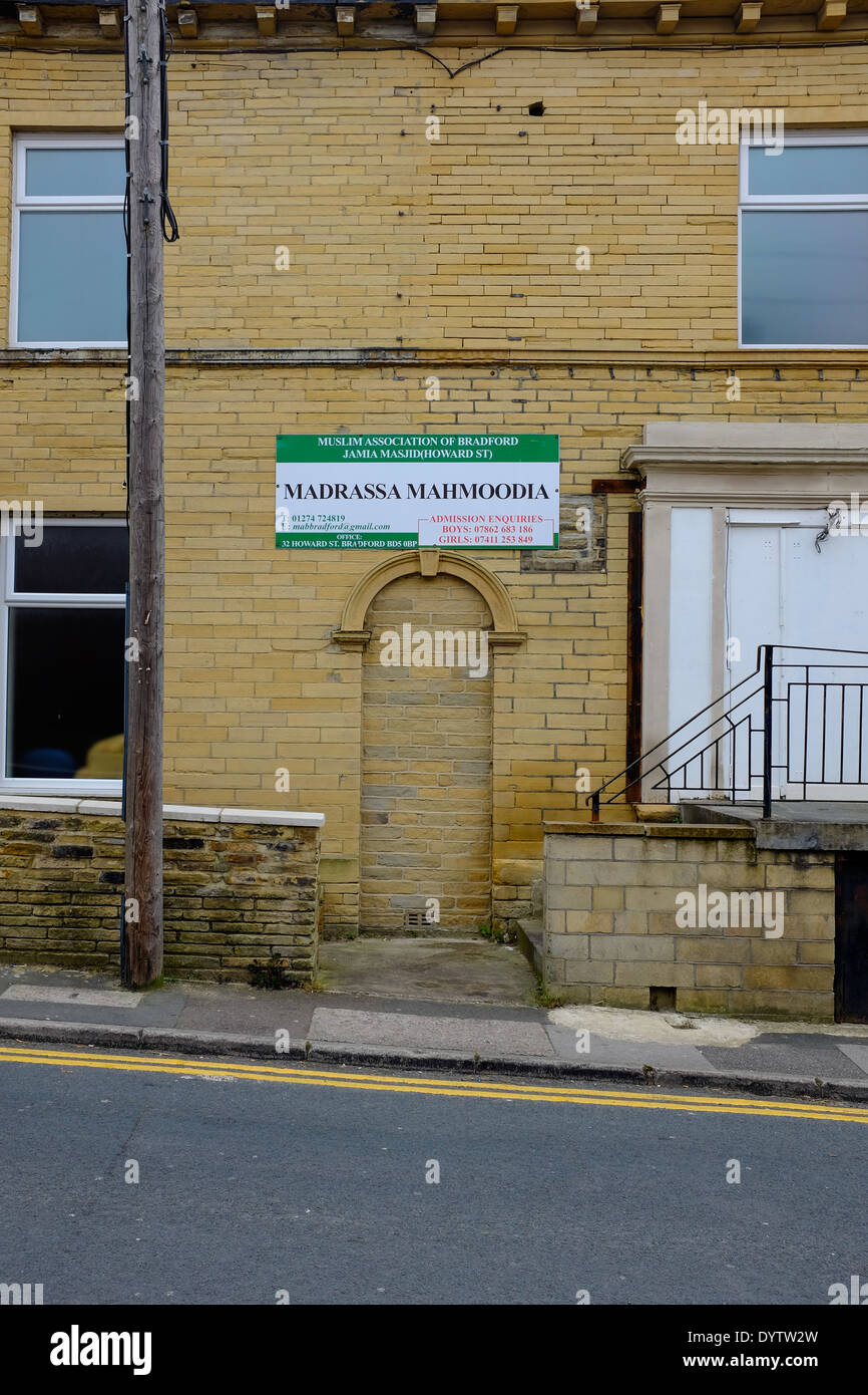 'Madrassa Mahmoodia' sign on a building, an Islamic Muslim School in Bradford, West Yorkshire, UK. Stock Photo