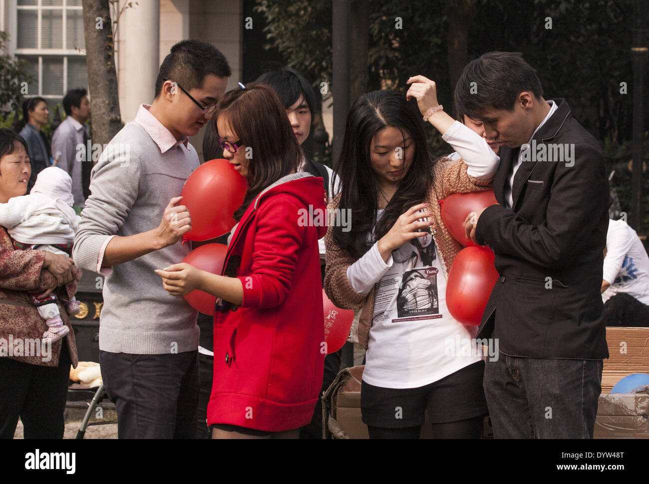 Women and men participate in games in a Shanghai's first 'Marriage and Love Expo' Stock Photo