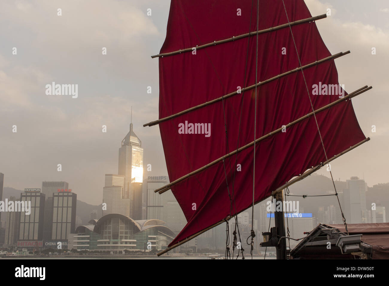 A junk for tourists is berthing at Hong Kong harbour, 2012 Stock Photo