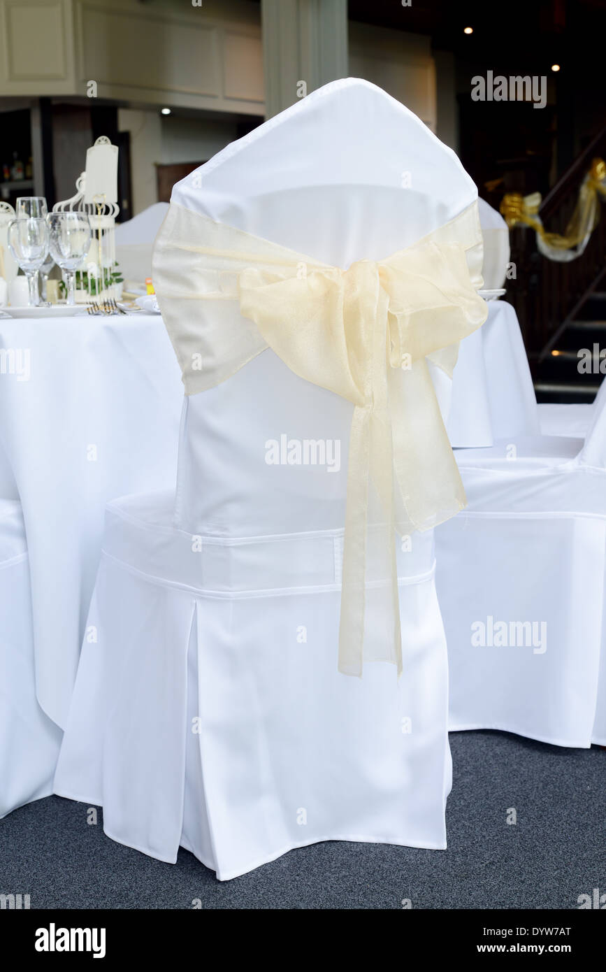 Wedding Reception Chair Cover Is White And Gold Or Yellow Stock