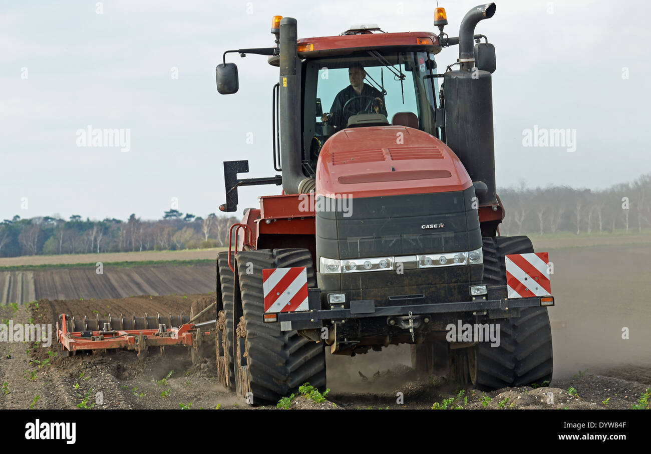 Arable farmland being subsoiled, Sutton, Suffolk, UK. Stock Photo