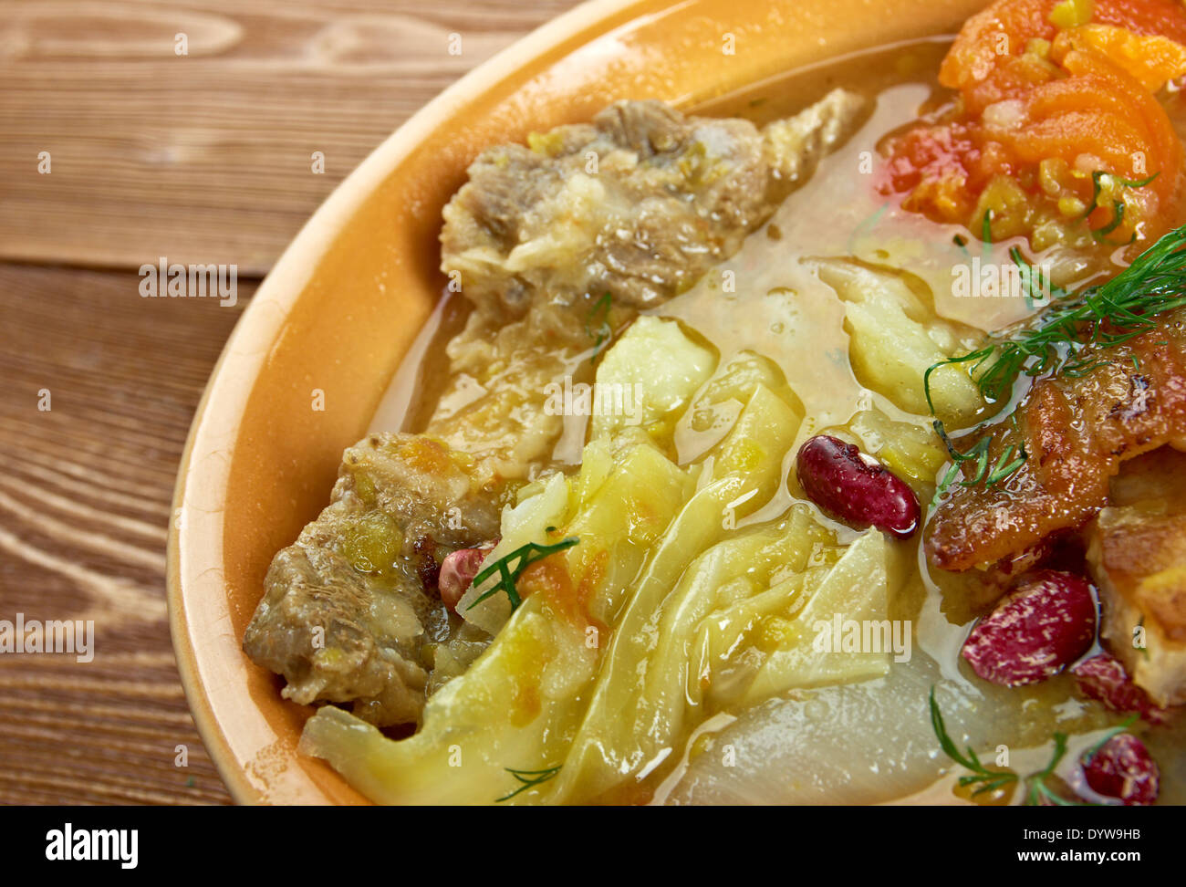 Olla podrida - Spanish stew made from pork and beans, Stock Photo