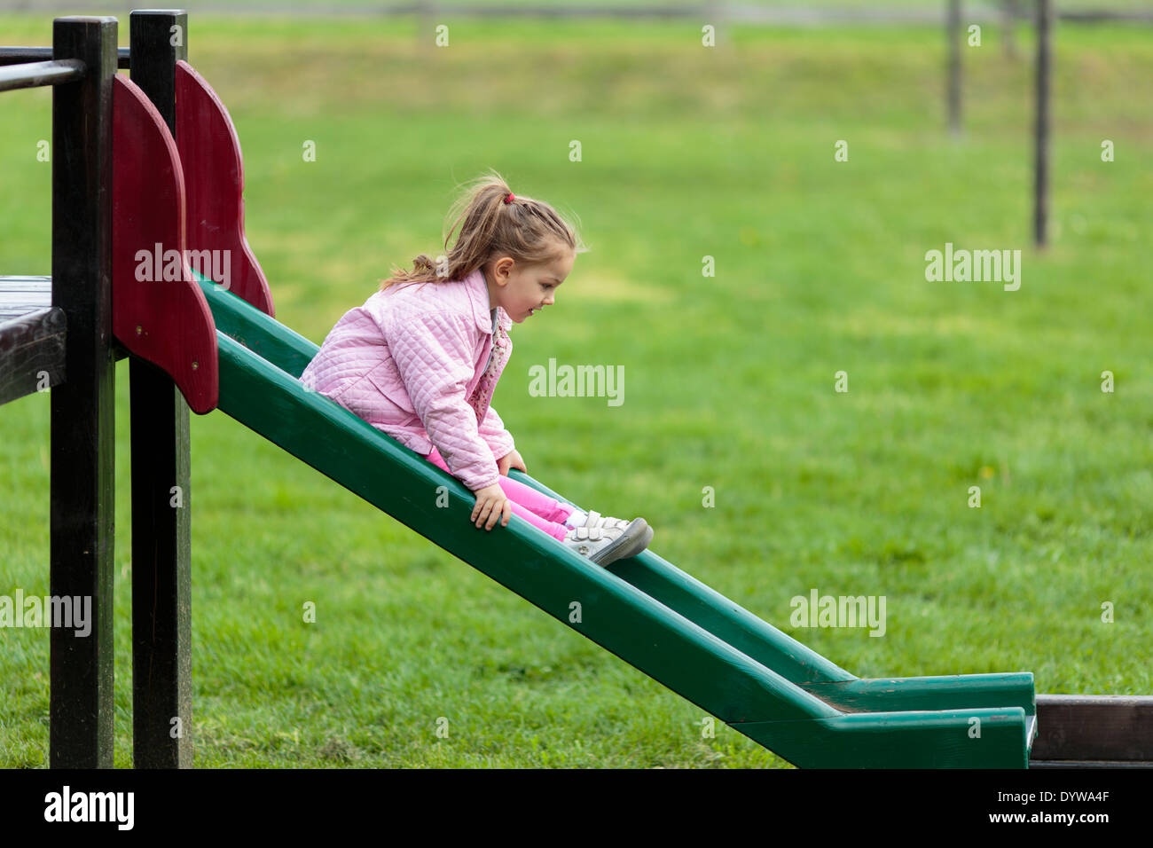 Cute little girl playing in the park Stock Photo