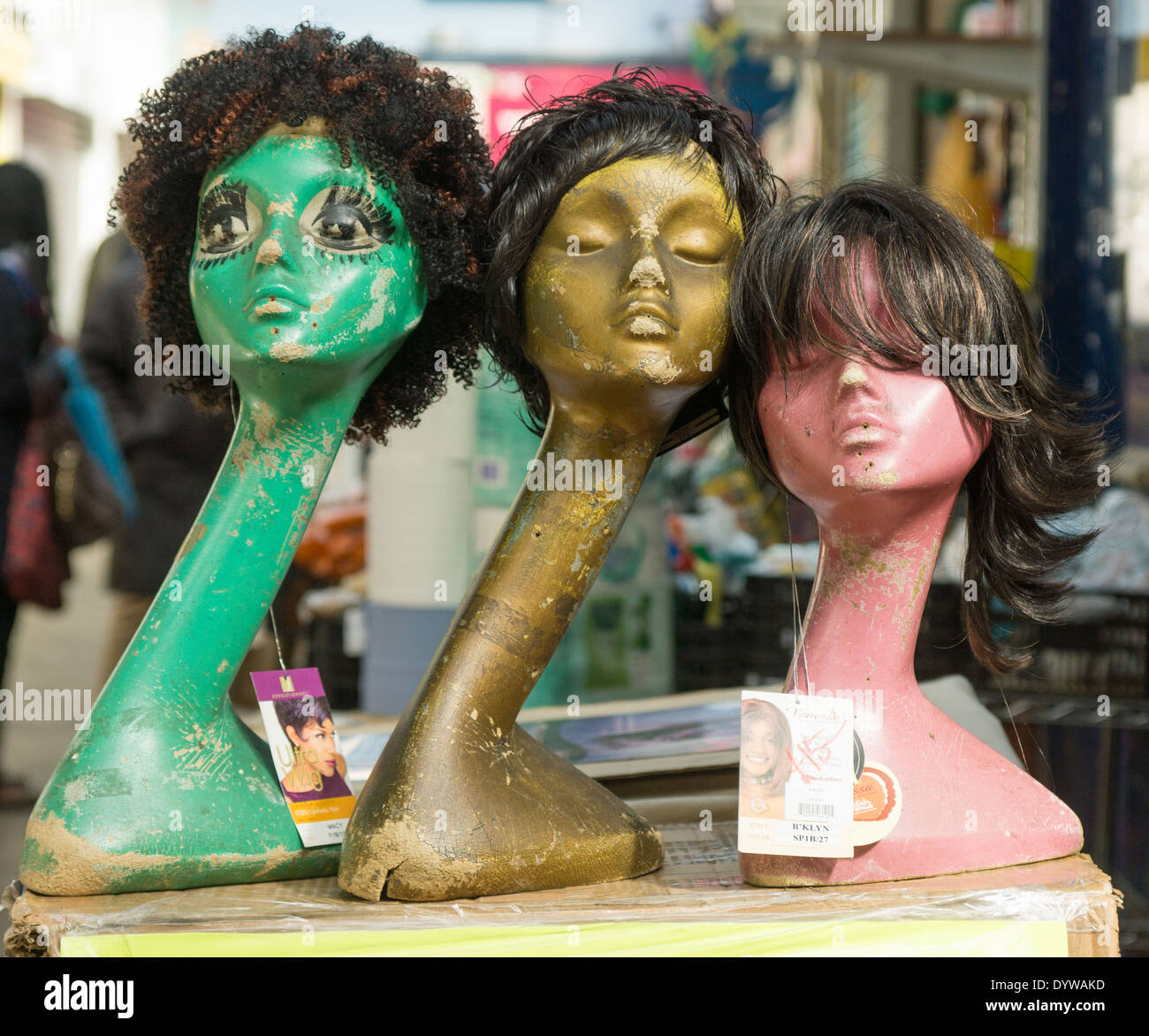 wigs on dummy.  Afro wigs for sale in Brixton Market Stock Photo