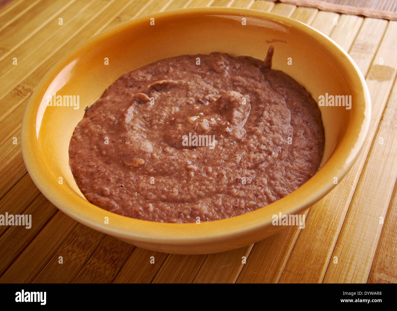 Refried beans dish of cooked and mashed beans and is a traditional staple of Mexican and TexMex